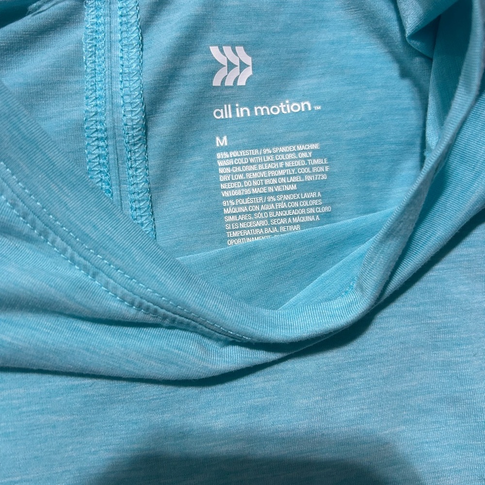 All in Motion Teal Performance Top for woman’s exercises